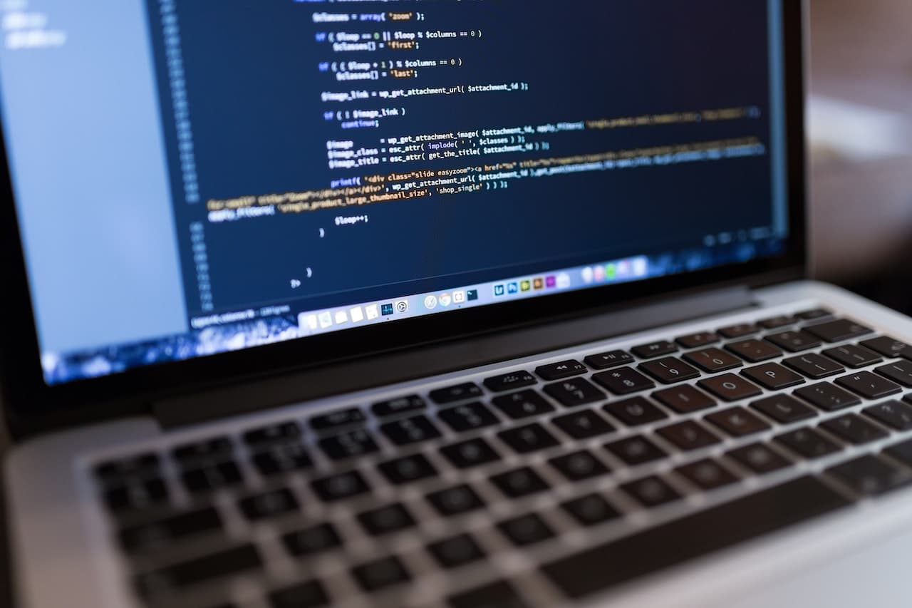 a laptop with a coding tool software open